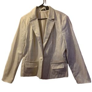 Cream colored tuxedo jacket.